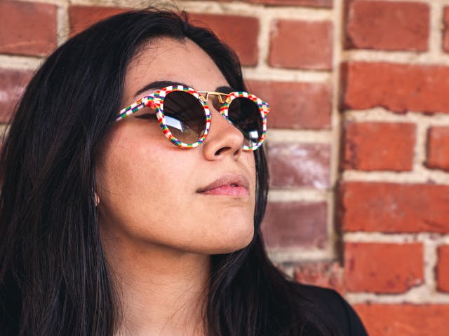 Krewe stylist modelling Krewe Pride Collection sunglasses